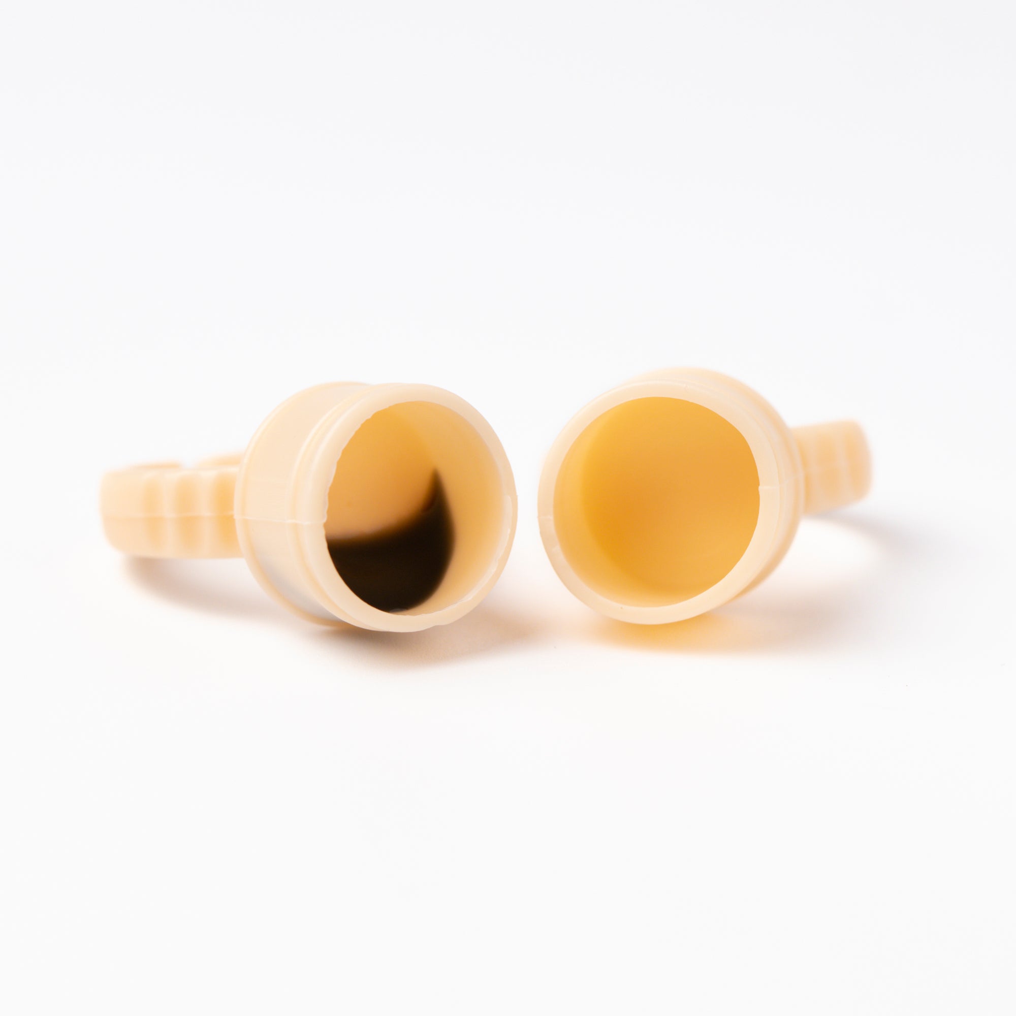 two Silicon Glue Rings over a white background.