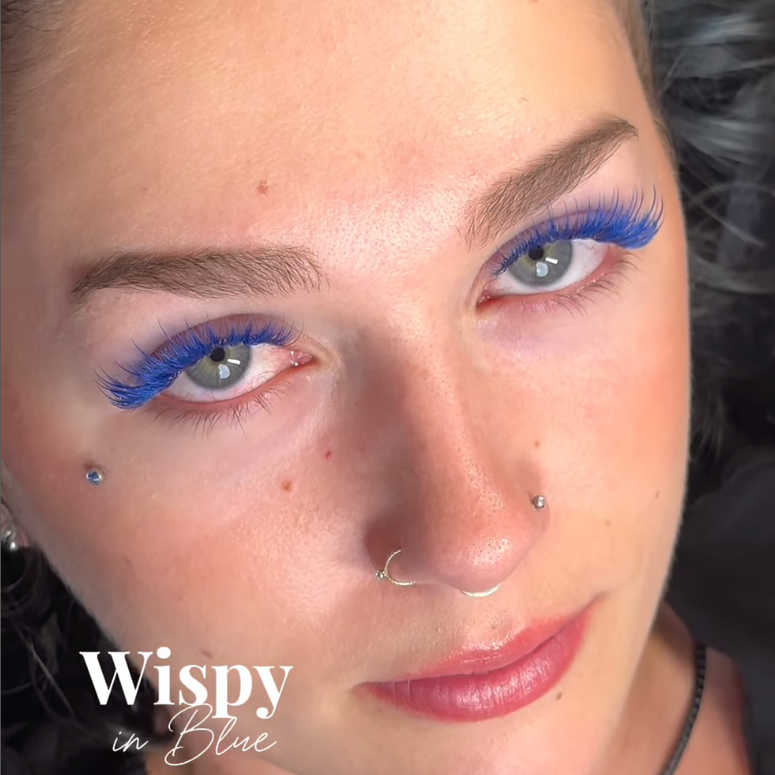 Blue promade lashes on a model.