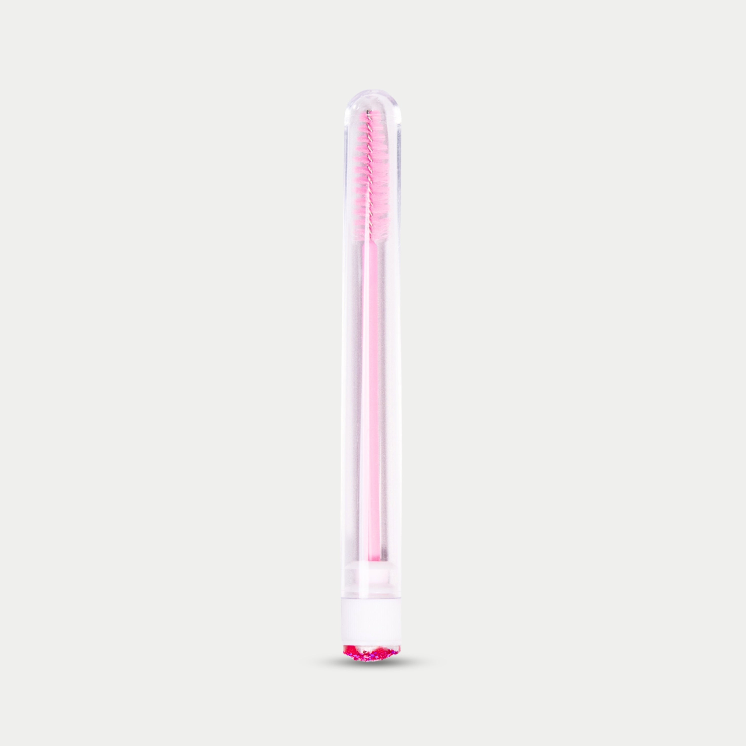 1 Mascara Brushes with Tubes over a light background