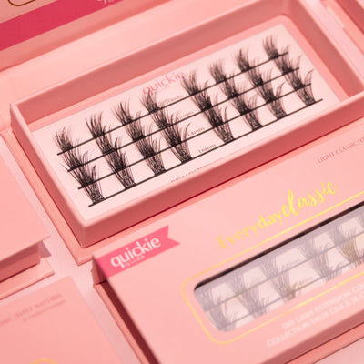 Close-up of DIY lash extension set in pink packaging, by Quickie, featuring lash lengths which are 10mm, 12mm, 14mm, and 16mm for dramatic volume.