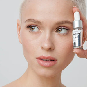 Model holding BrowXenna® Botox-X 10 ml bottle