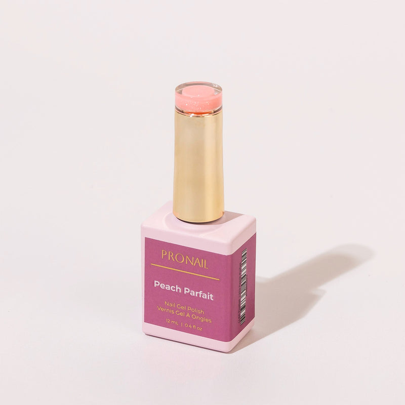 LLBA Peach Parfait Gel Polish bottle with a gold cap and pink label on a light background.