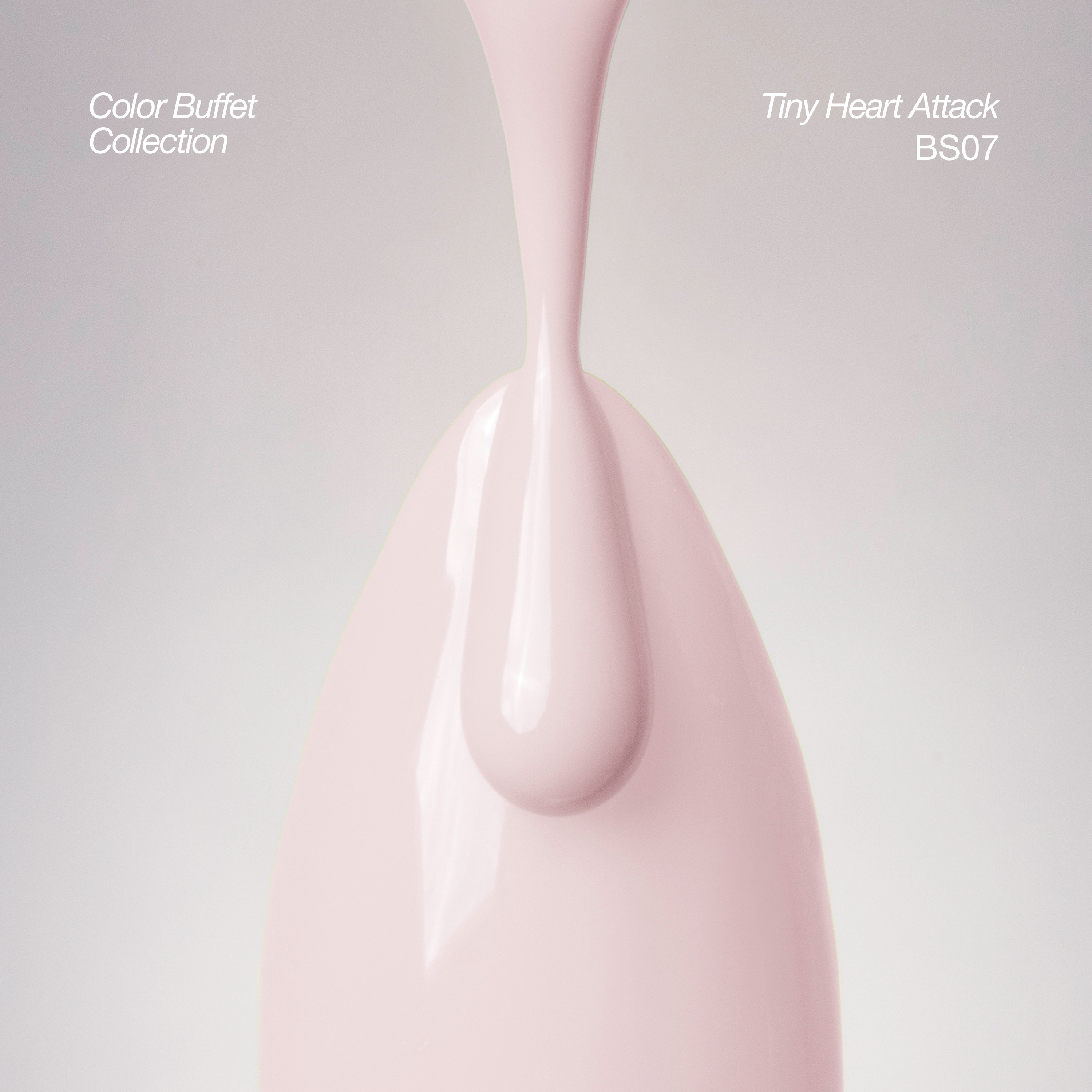 A glossy light pink product with a teardrop-shaped top and smooth curved body, shown against a soft light gray background. White text in the corners reads &