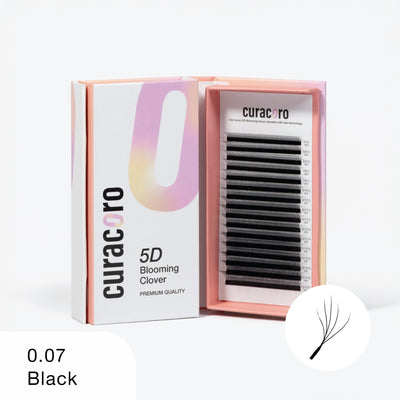 An open box of Curacoro 5D Blooming Clover premium quality eyelash extensions in black, with a 0.07 thickness.