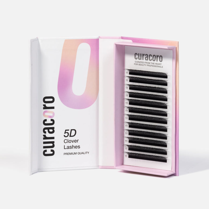 An open box of Curacoro 5D Clover Lashes premium quality eyelash extensions in black, with a 0.07 thickness.