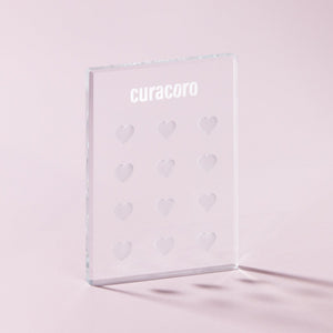 Crystal Glue Holder Over Pink Background