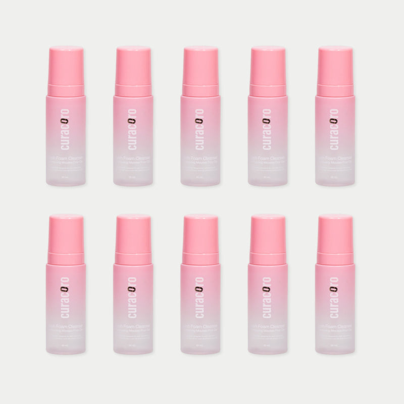 Ten Curacoro Lash Foam Bath 60ml (Rose Scented) in a grid pattern on a light background, featuring pink pumps.