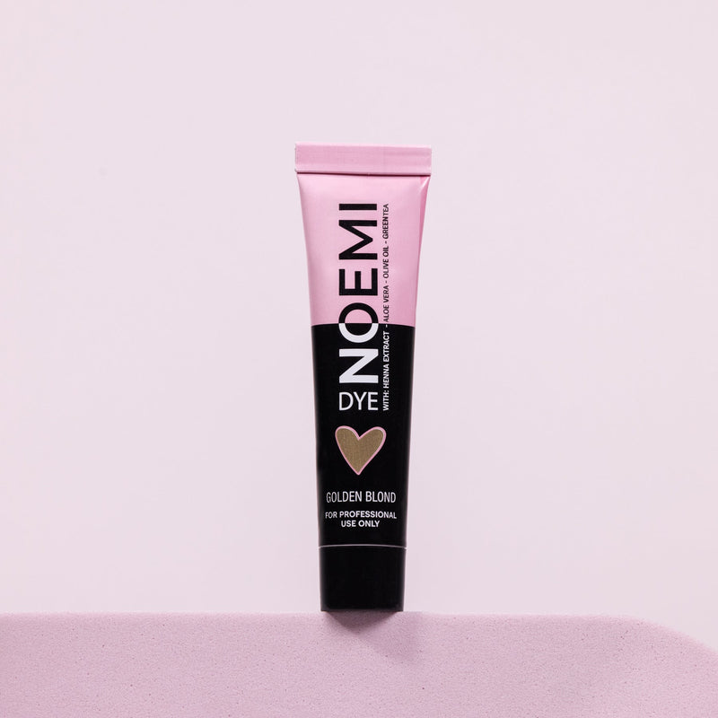 Noemi Hybrid Brow & Lash Dye - Golden Blond Bottle Over Pink Background