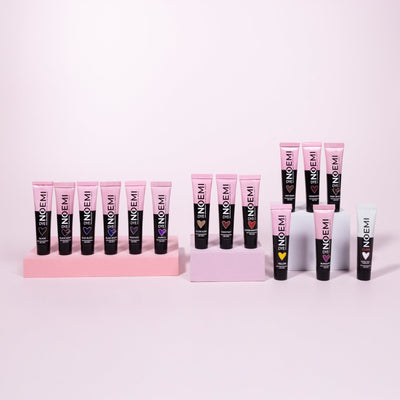 Noemi Hybrid Brow & Lash Dye Group Shot Over Pink Background