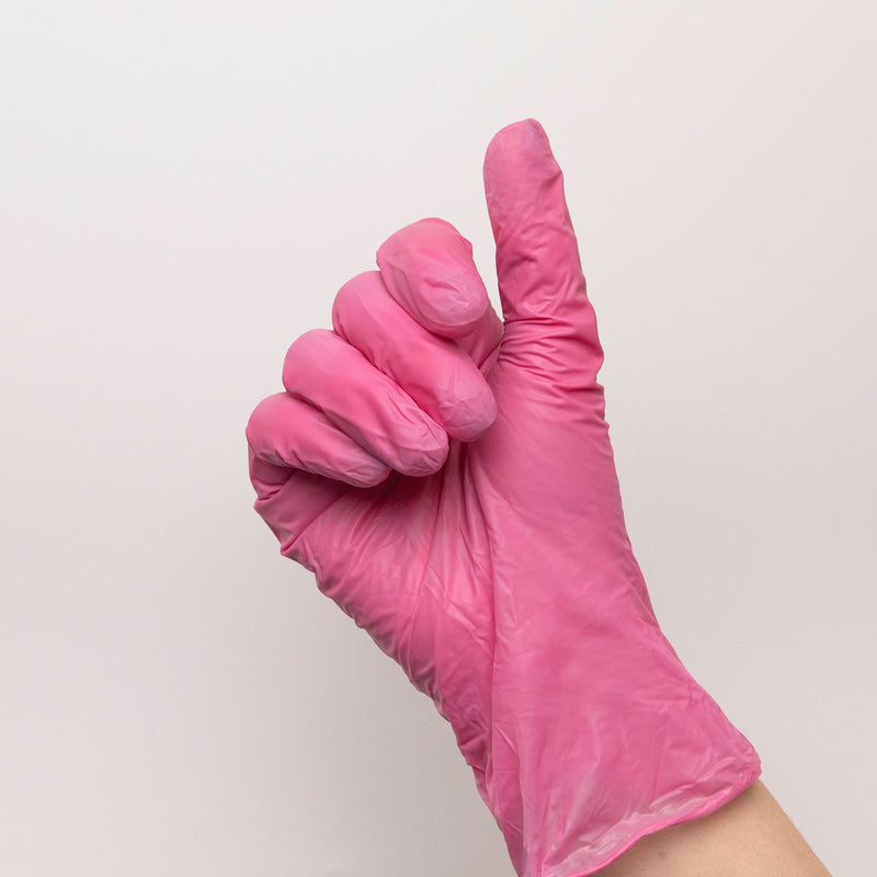 Pink disposable glove on model&