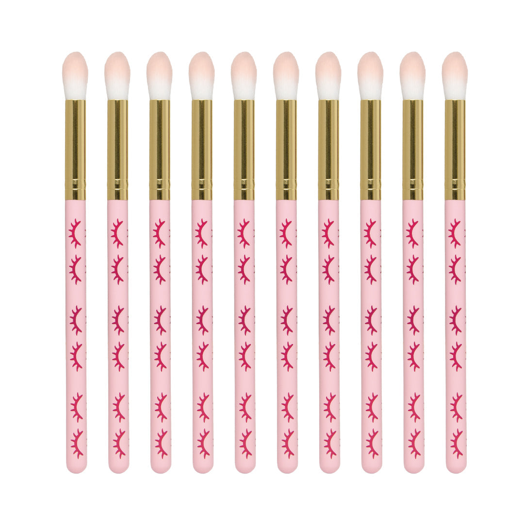 Extended wooden cleansing brush (pack of 10) colour pink, over white background. 