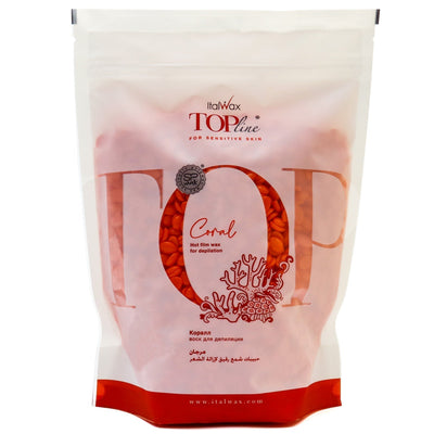 ItalWax Top Line Coral hot film wax for sensitive skin in a clear package on a white background.