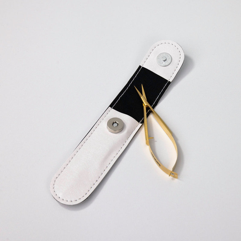 Gold Eyebrow Scissors with the case.