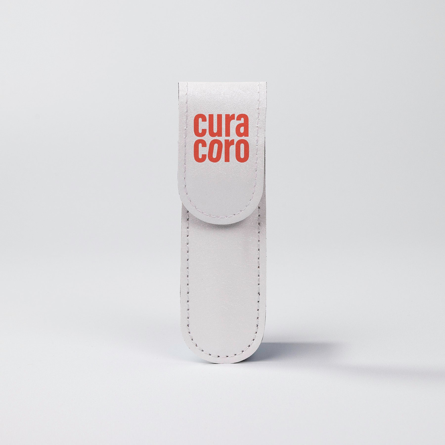 Gold Eyebrow Scissors orange case.