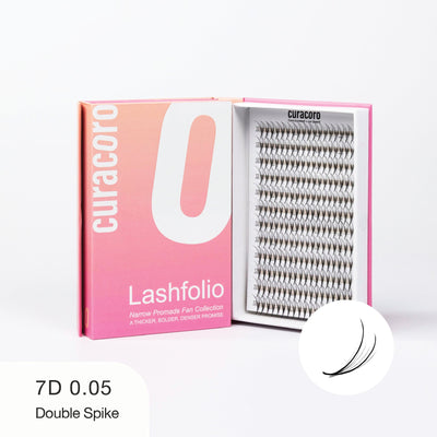 Curacoro Lashfolio 7D 0.05 Double Spike lashes in pink gradient packaging with open tray displaying dense lash fans.