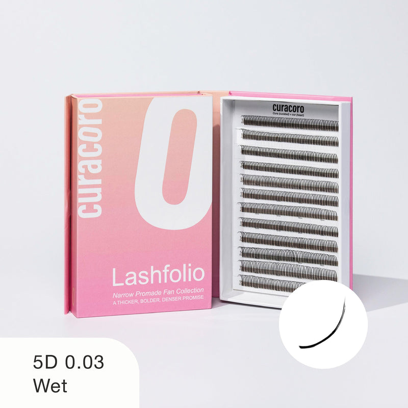 Curacoro Lashfolio 5D 0.03 Wet narrow promade fan lashes in pink packaging, ideal for bold, dense lash extensions.