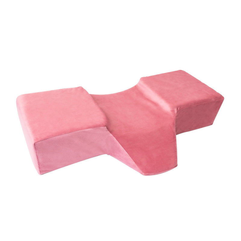 Pink Memory Foam Pillow in front of a white background.