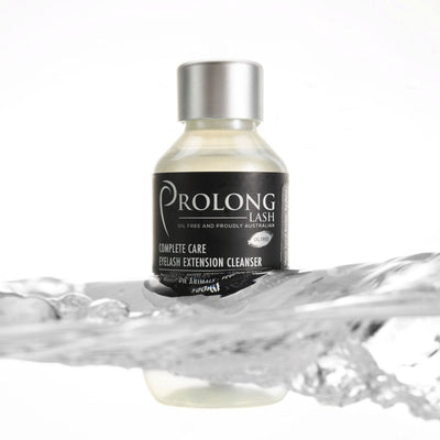 Prolong Lash Cleanser concentrate bottle partially submerged in water