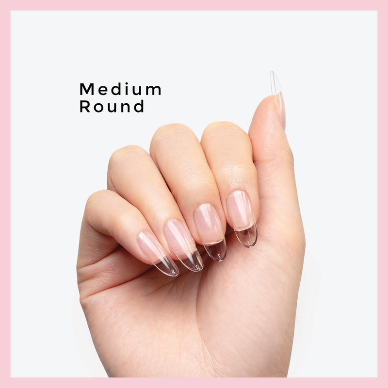 Curacoro Medium Round Soft Gel Nail Tips displayed on a hand with a white background.