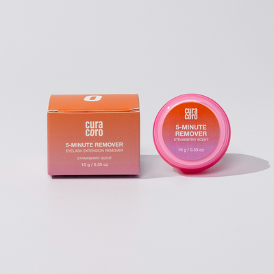 Small orange box and pink container labeled "5-Minute Remover" on a white background.