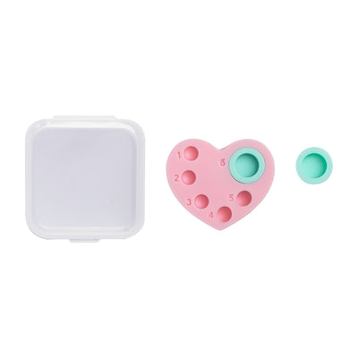 Heart Silicon Palette for Lash Lift in front of a white background.