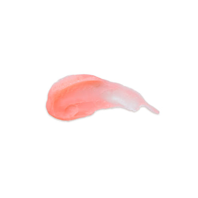 Peach-colored cream smear on a white background.