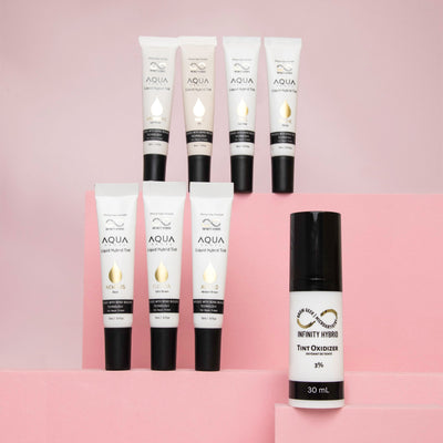 Tubes of brow tint shades and a bottle of tint oxidizer