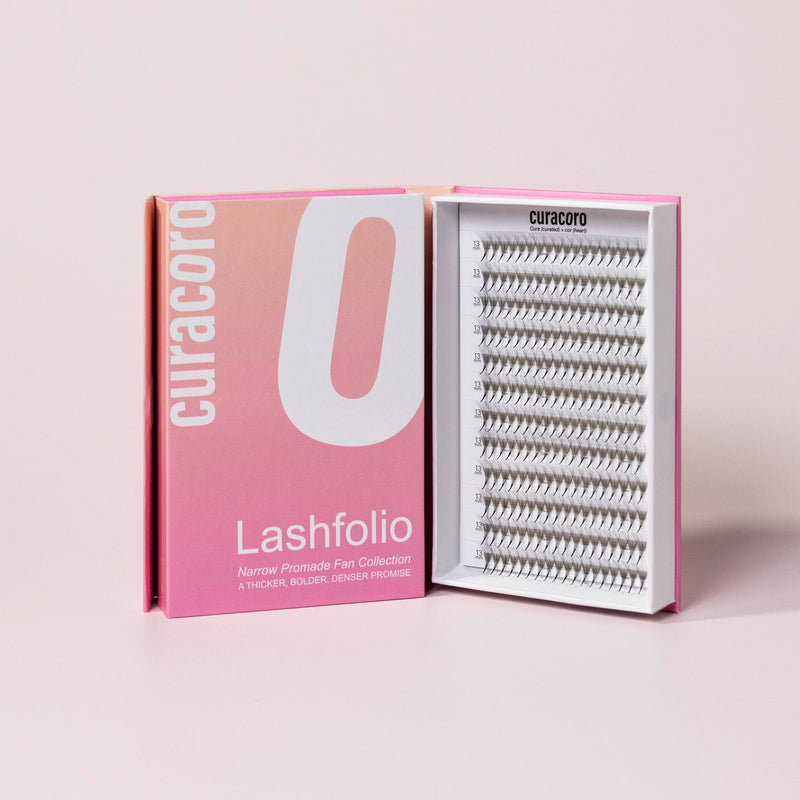 Lashfolio in front of a pink background with an open case.