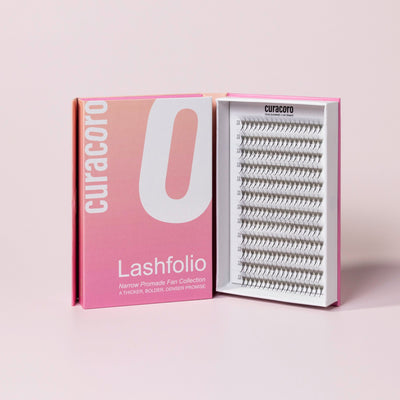 Lashfolio in front of a pink background with an open case.