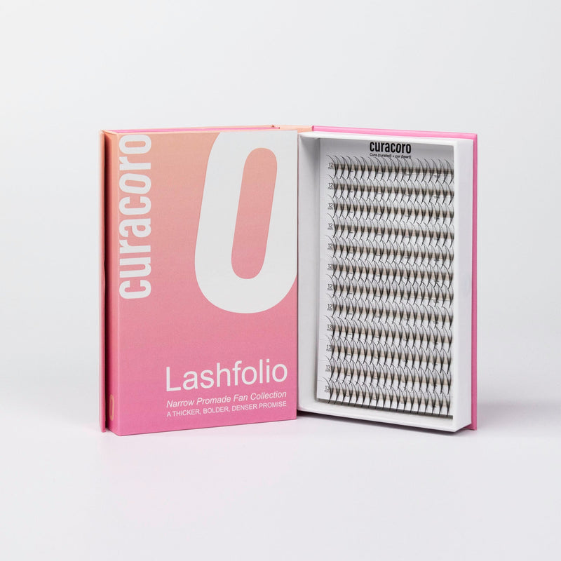 Lashfolio Double Spike standing in front of a white background with an open case.