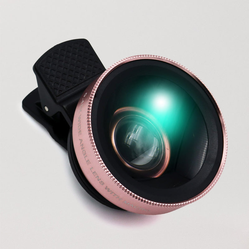 0.45X wide-angle clip-on macro lens for phone cameras in rose gold, featuring a green-tinted glass.