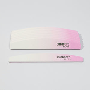 Dual-Sided Nail Files Over White Background