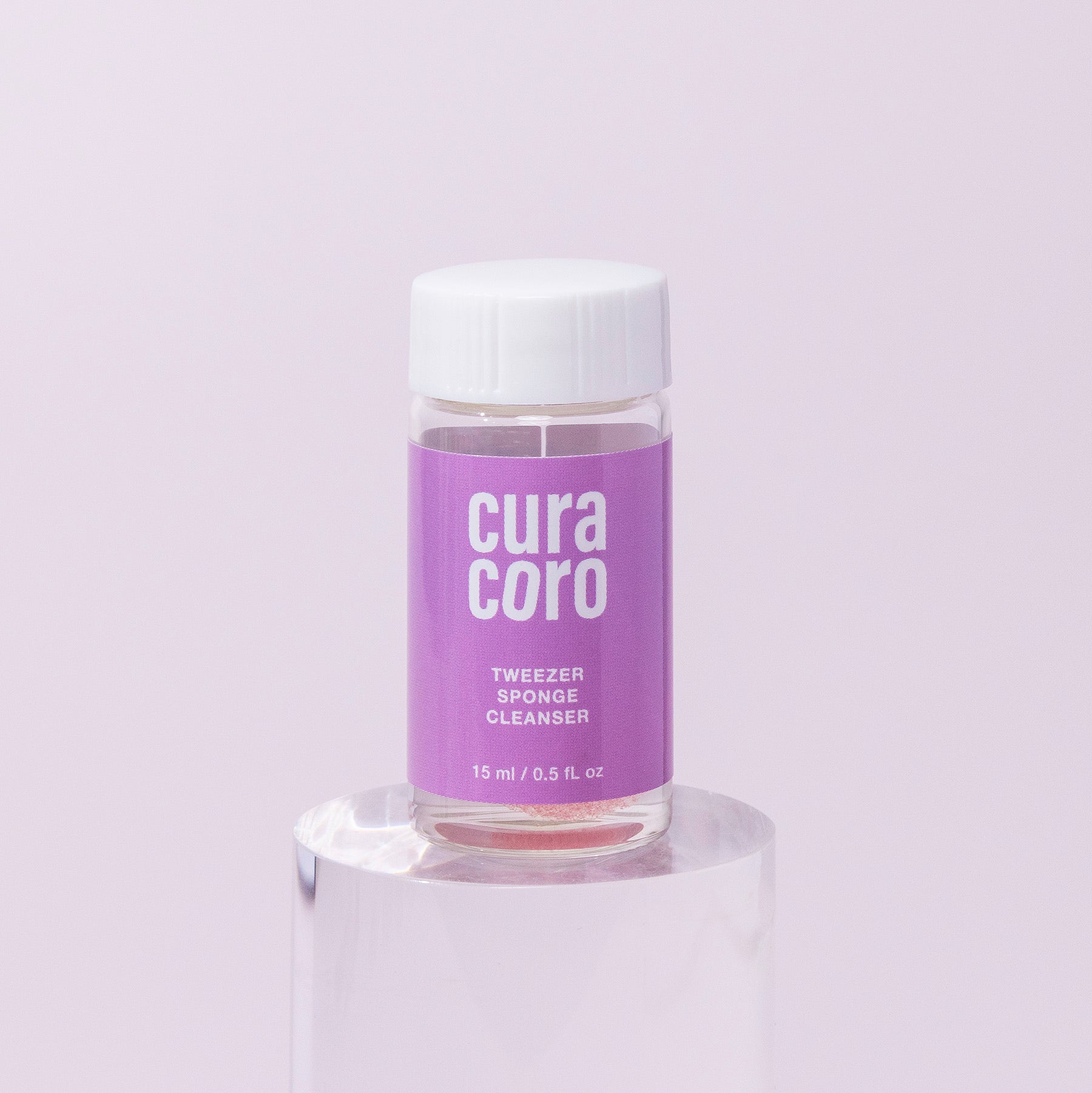 Tweezer cleanser Bottle Close Up Over Light Background