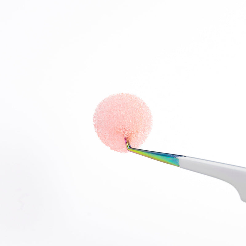 Tweezer Sponge Cleanser Hold by a Tweezer Close Up