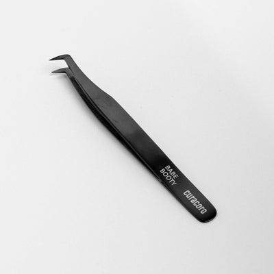 Babe Booty Tweezer Onyx over a white background. 