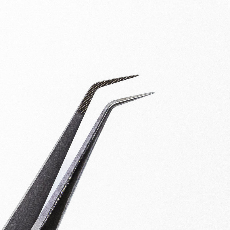 All The Fluff Tweezer Silver close up