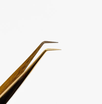 All The Fluff Tweezer Gold close up