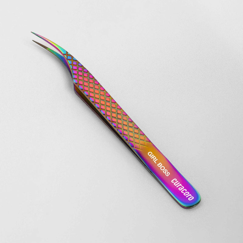 Girl Boss Tweezer Galaxy over a light background. 