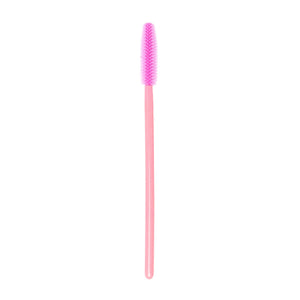 Image of a disposable pink silicon brush wand for eyelashes and brows in a white background.